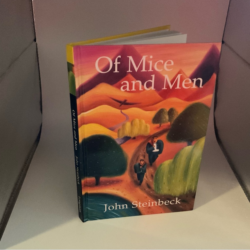 Of Mice and Men  by John Steinbeck hardcover was used for high school students.